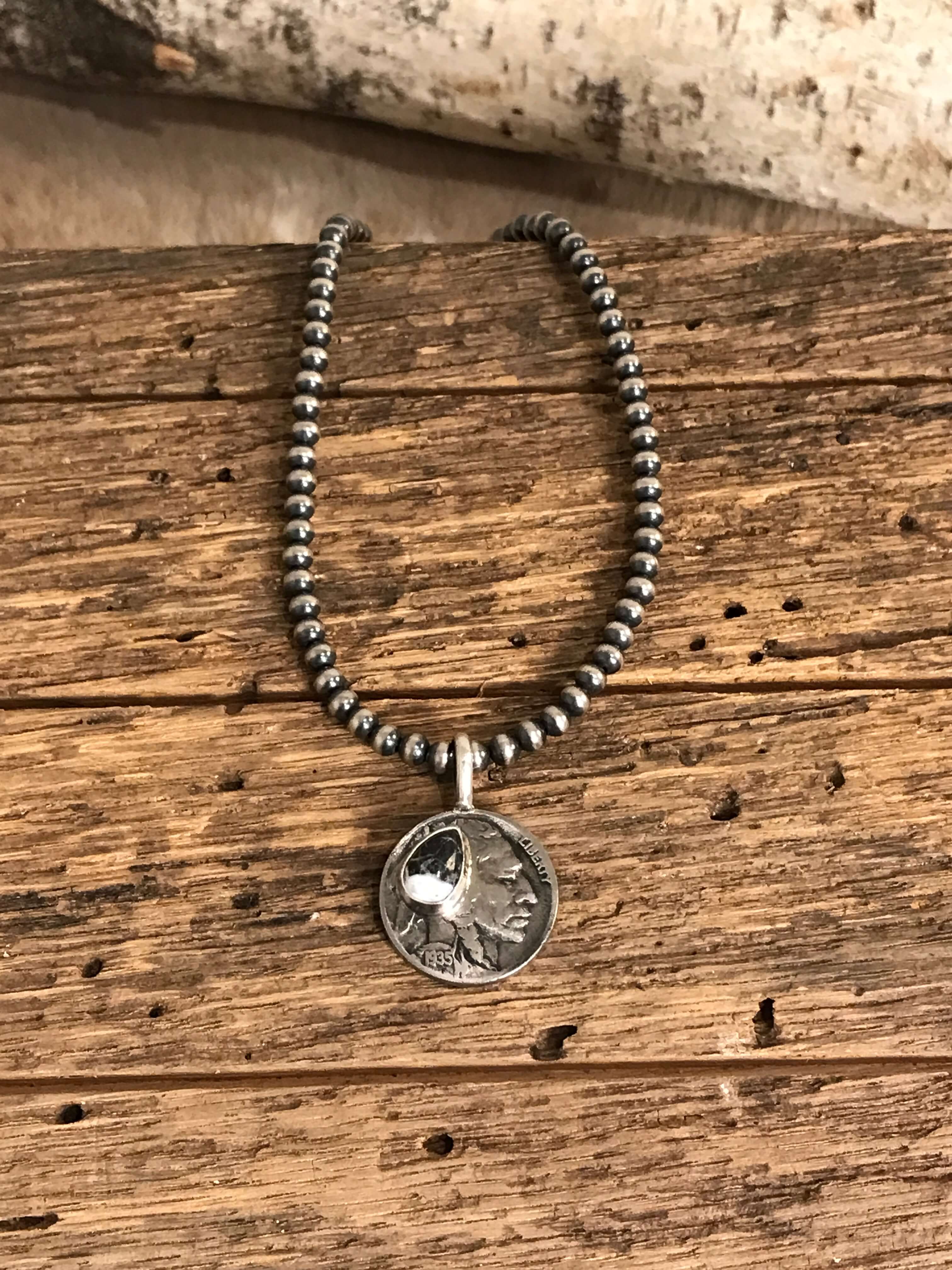 The Buffalo Nickel Pendants in White Buffalo-Pendants-Calli Co., Turquoise and Silver Jewelry, Native American Handmade, Zuni Tribe, Navajo Tribe, Brock Texas
