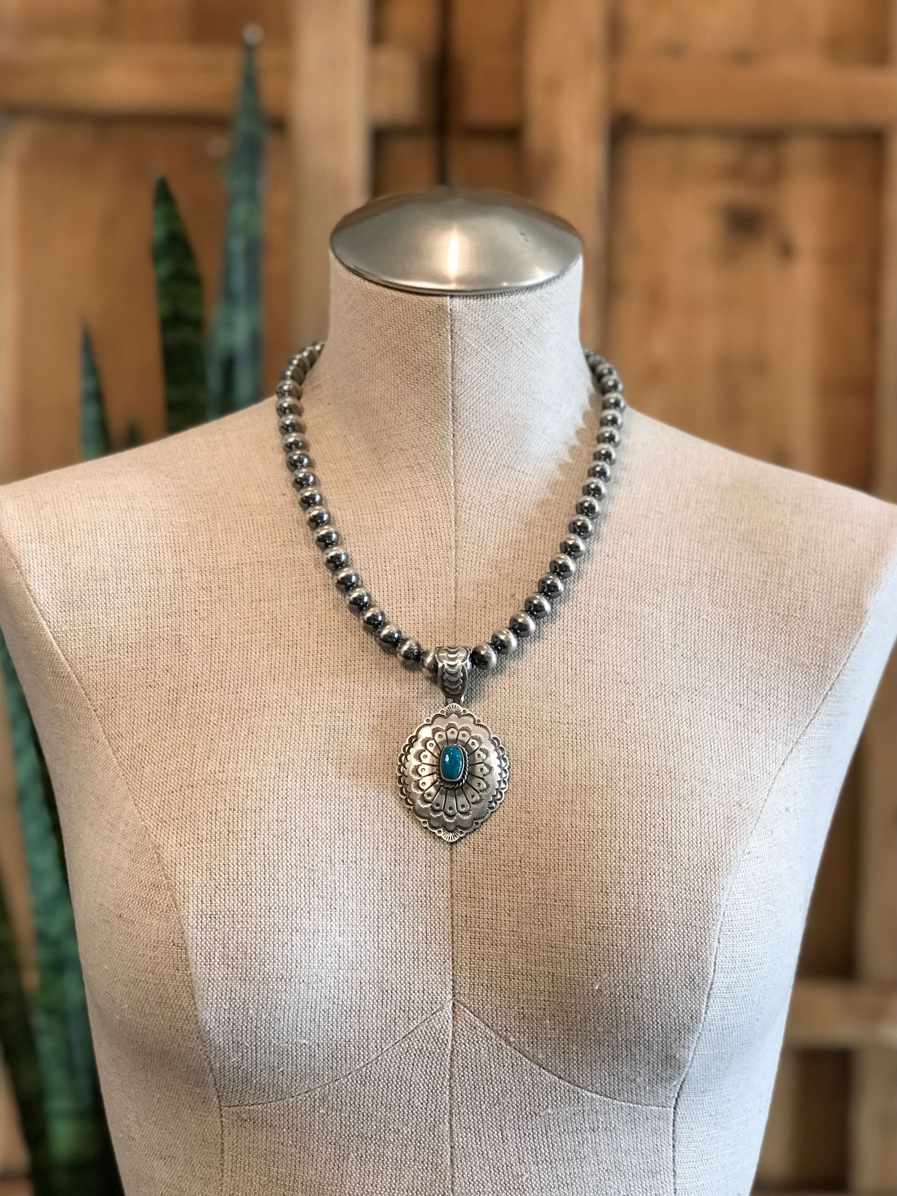 The Encinitas Concho Pendant, 2-Pendants-Calli Co., Turquoise and Silver Jewelry, Native American Handmade, Zuni Tribe, Navajo Tribe, Brock Texas