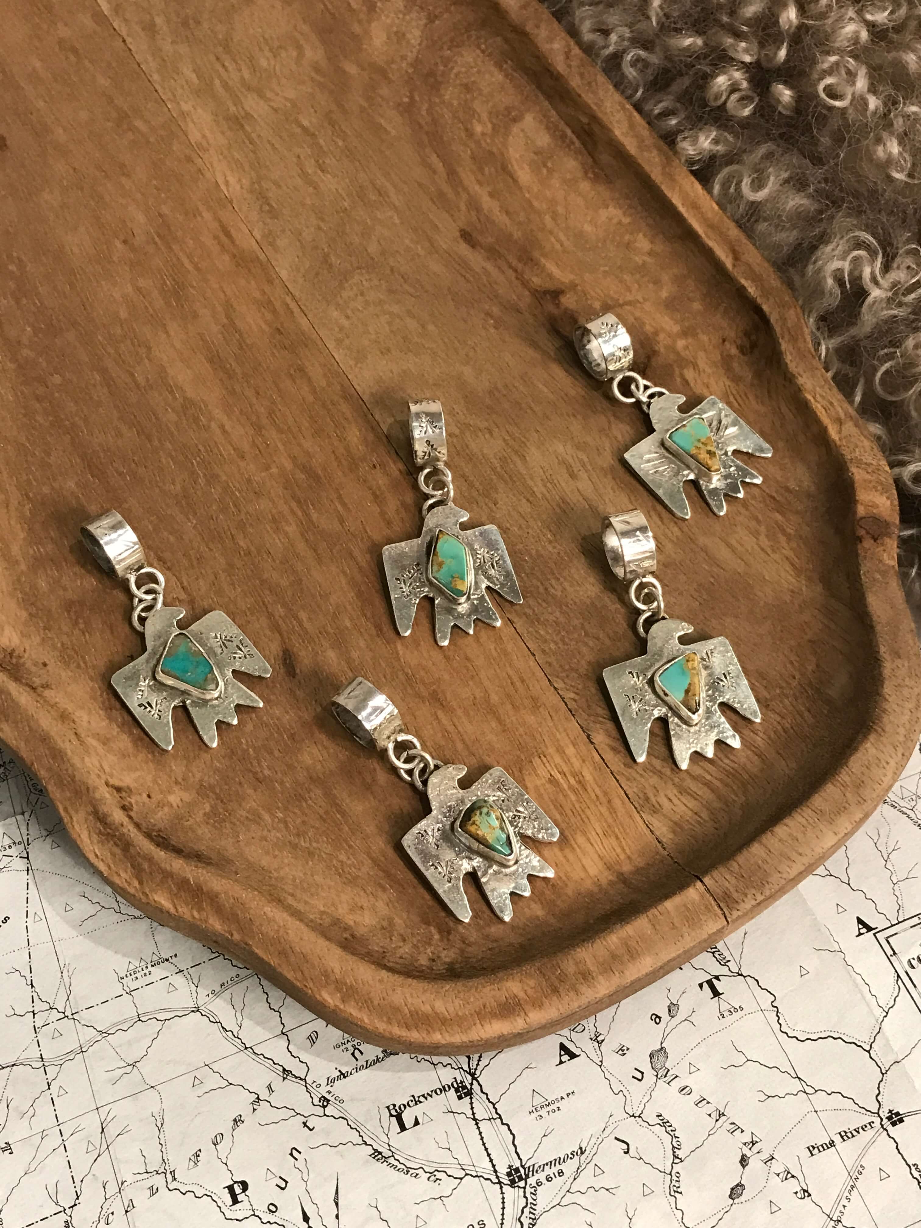 The Turquoise Thunderbird Pendants-Pendants-Calli Co., Turquoise and Silver Jewelry, Native American Handmade, Zuni Tribe, Navajo Tribe, Brock Texas