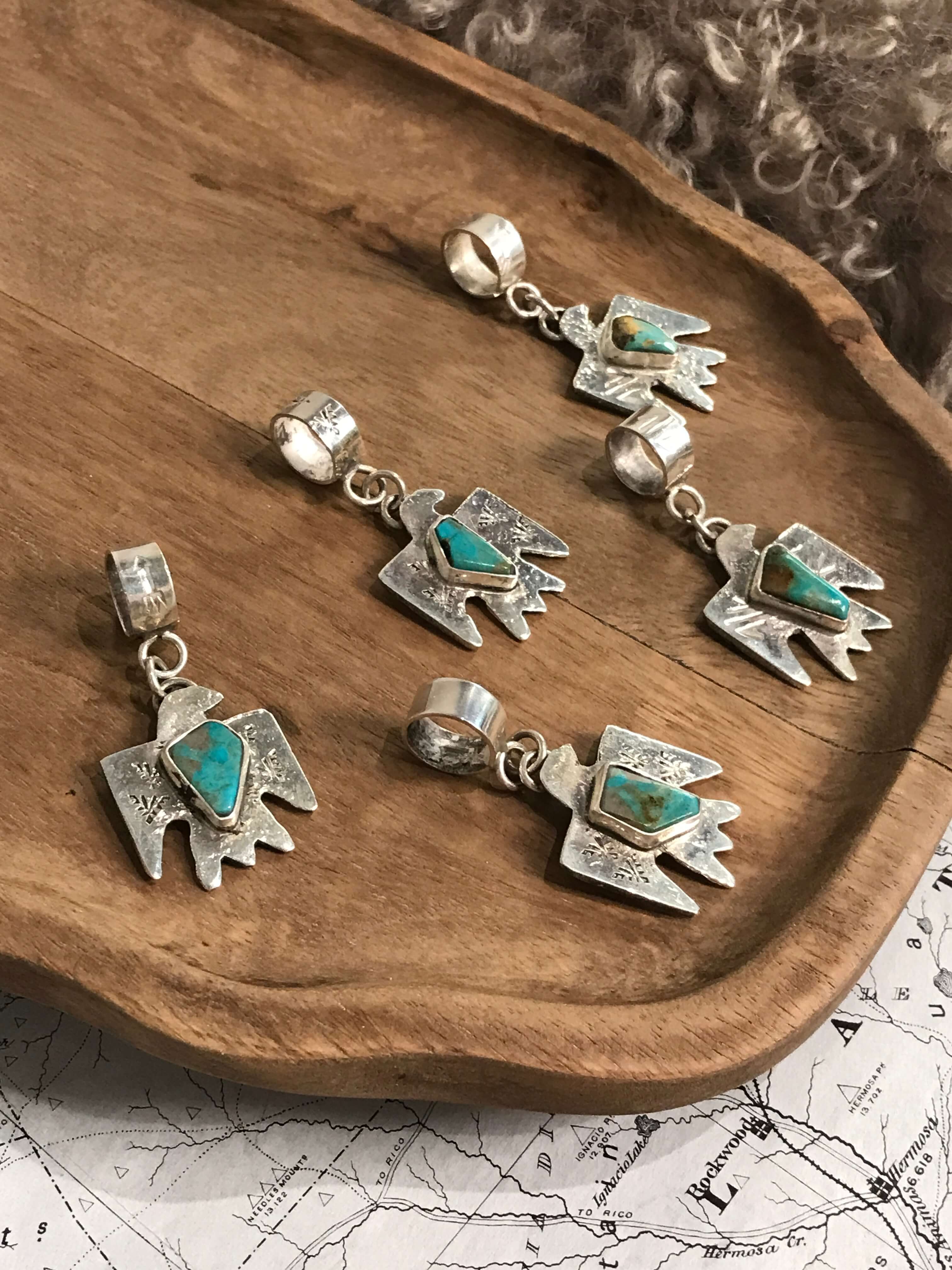 The Turquoise Thunderbird Pendants-Pendants-Calli Co., Turquoise and Silver Jewelry, Native American Handmade, Zuni Tribe, Navajo Tribe, Brock Texas