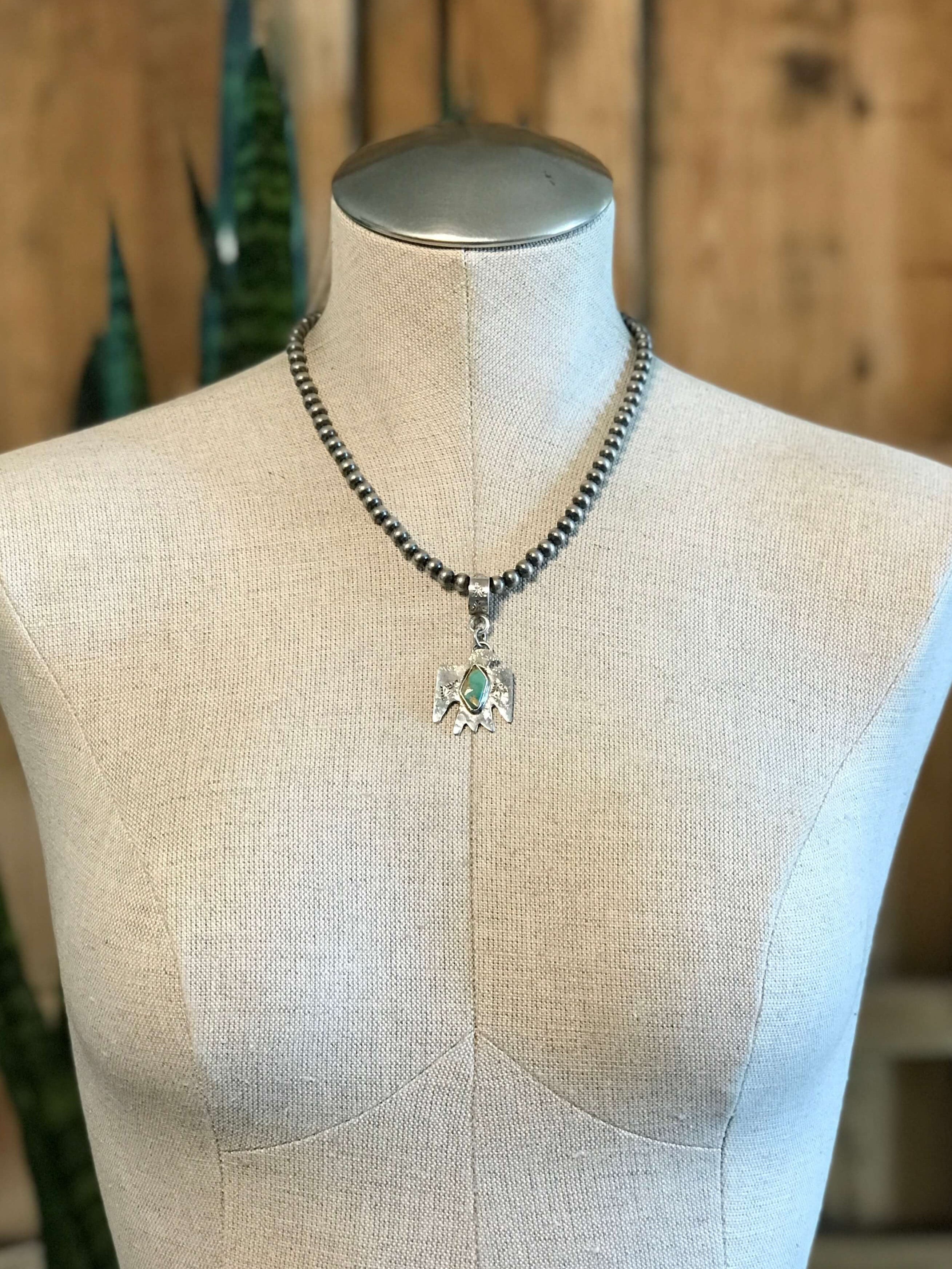 The Turquoise Thunderbird Pendants-Pendants-Calli Co., Turquoise and Silver Jewelry, Native American Handmade, Zuni Tribe, Navajo Tribe, Brock Texas