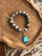 The Osage Dime Bracelet, 5-Bracelets & Cuffs-Calli Co., Turquoise and Silver Jewelry, Native American Handmade, Zuni Tribe, Navajo Tribe, Brock Texas