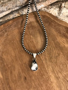 The Coy White Buffalo Pendants-Pendants-Calli Co., Turquoise and Silver Jewelry, Native American Handmade, Zuni Tribe, Navajo Tribe, Brock Texas