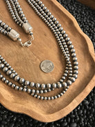 The Sabinal Triple Strand Pearl Necklace, 36"-Necklaces-Calli Co., Turquoise and Silver Jewelry, Native American Handmade, Zuni Tribe, Navajo Tribe, Brock Texas