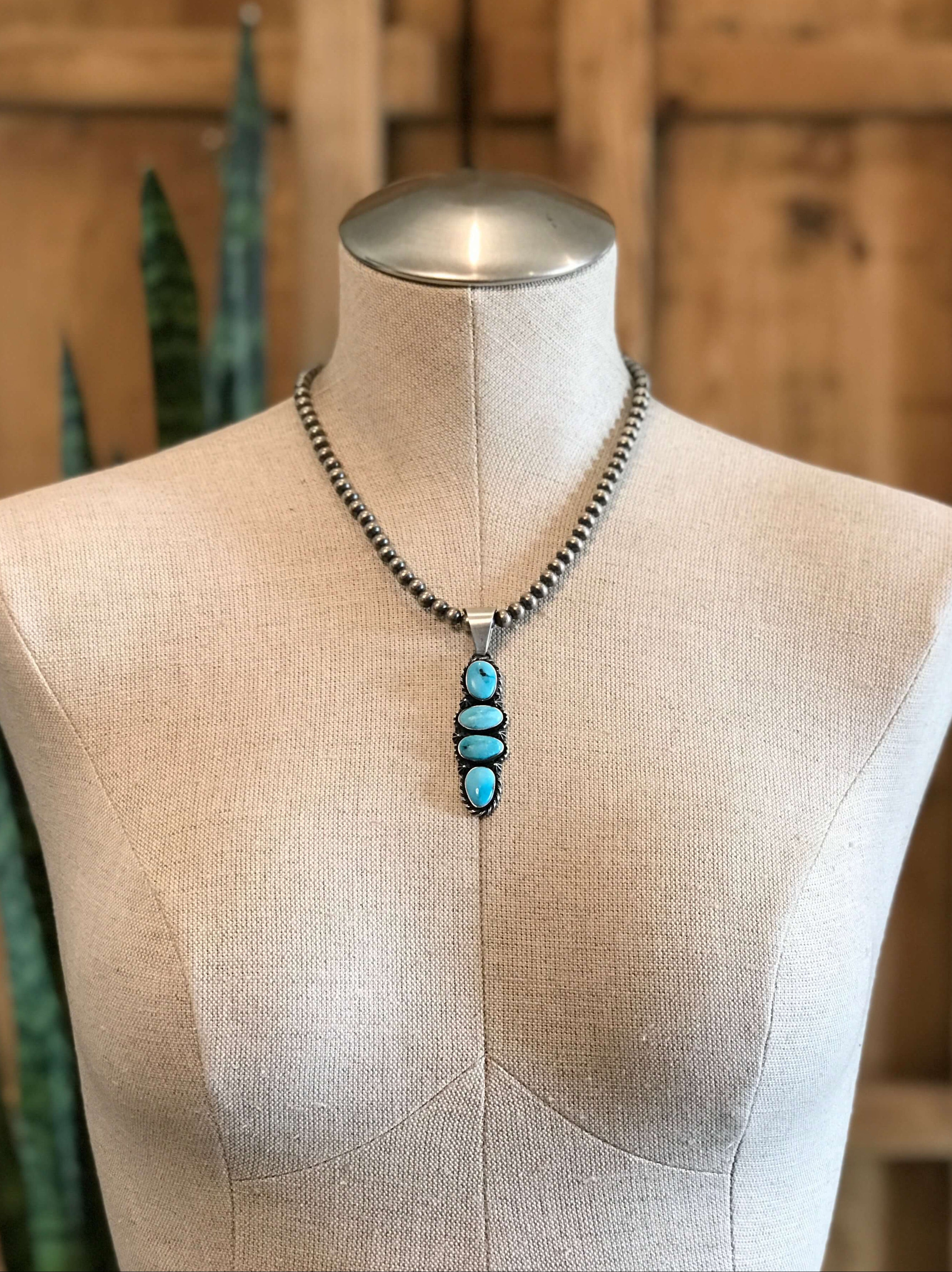 The Tobago Turquoise Pendant, 2-Pendants-Calli Co., Turquoise and Silver Jewelry, Native American Handmade, Zuni Tribe, Navajo Tribe, Brock Texas