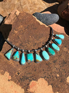 The Burnett Turquoise Pendant-Pendants-Calli Co., Turquoise and Silver Jewelry, Native American Handmade, Zuni Tribe, Navajo Tribe, Brock Texas