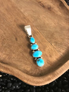 The Vamo Turquoise Pendant, 2-Pendants-Calli Co., Turquoise and Silver Jewelry, Native American Handmade, Zuni Tribe, Navajo Tribe, Brock Texas