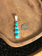 The Vamo Turquoise Pendant, 2-Pendants-Calli Co., Turquoise and Silver Jewelry, Native American Handmade, Zuni Tribe, Navajo Tribe, Brock Texas