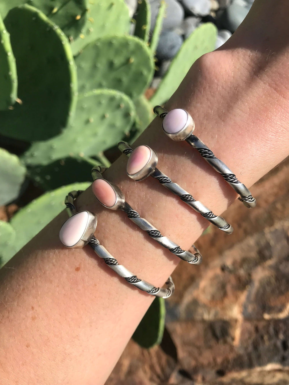 The McKinnon Pink Conch Cuffs-Bracelets & Cuffs-Calli Co., Turquoise and Silver Jewelry, Native American Handmade, Zuni Tribe, Navajo Tribe, Brock Texas