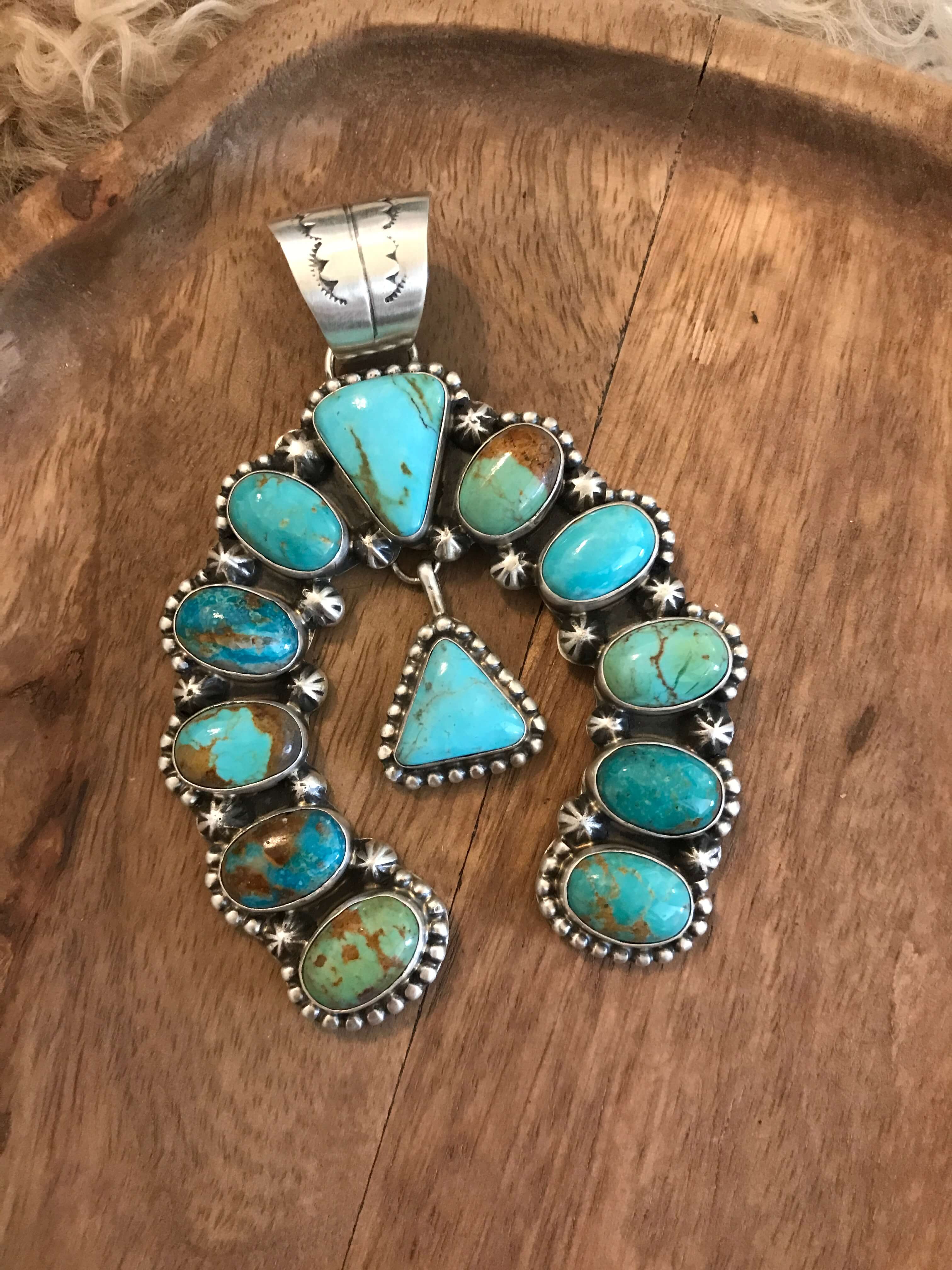 Purchases HUGE unique handmade turquoise pendant